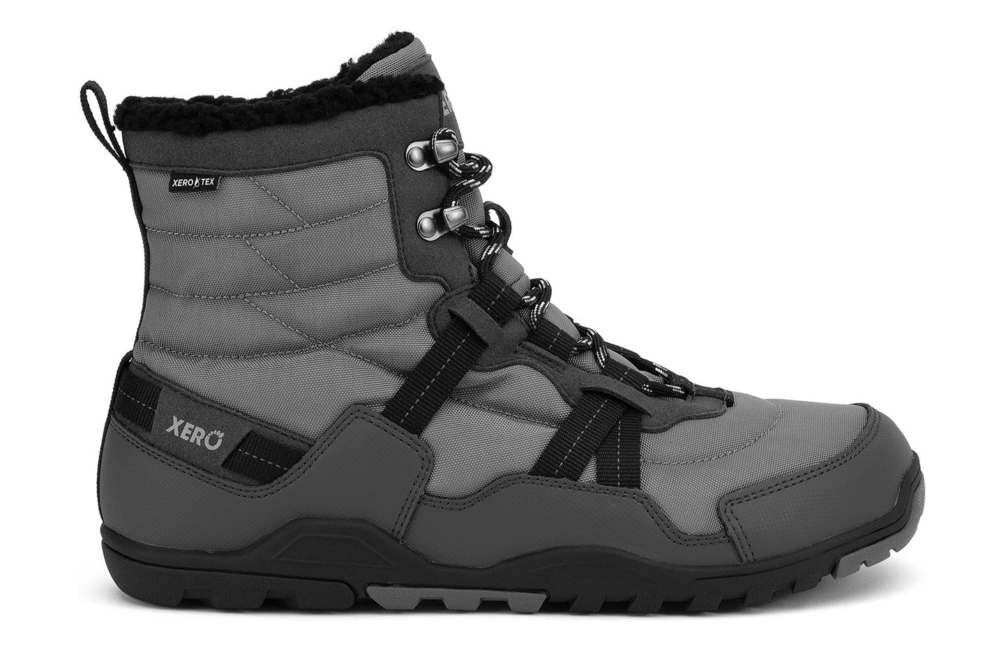 Xero Barefoot Shoes sold in Ontario, Canada. These minimalist shoes have flexible soles, wide toe boxes, and zero drop. Lateral side view of Xero Men's Alpine in Asphalt/Black. Waterproof, lightweight snow boot.