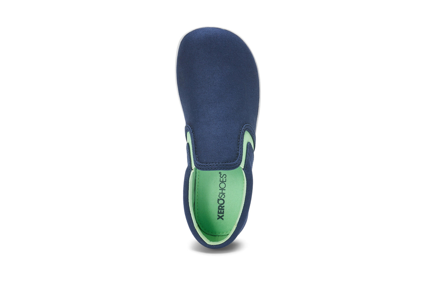Xero Kid's Barefoot Shoes sold in Ontario, Canada. These minimalist shoes have flexible soles, wide toe boxes, and zero drop. Angled view of Xero Youth Dillon Canvas Slip-On in Insignia Blue.