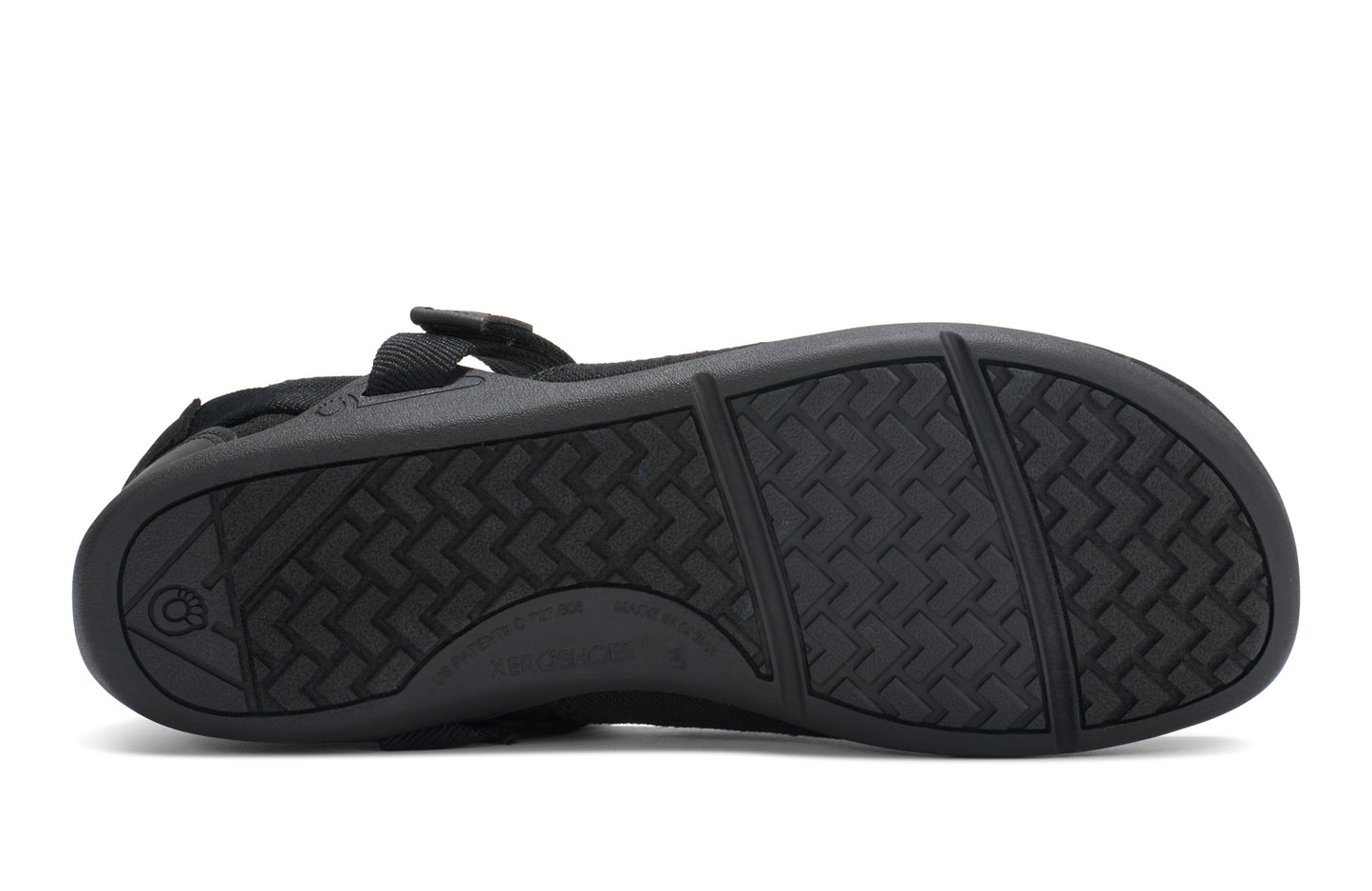 Black flat with a textured sole on a white background. Tru Stride Co brings Xero Shoes to Canada