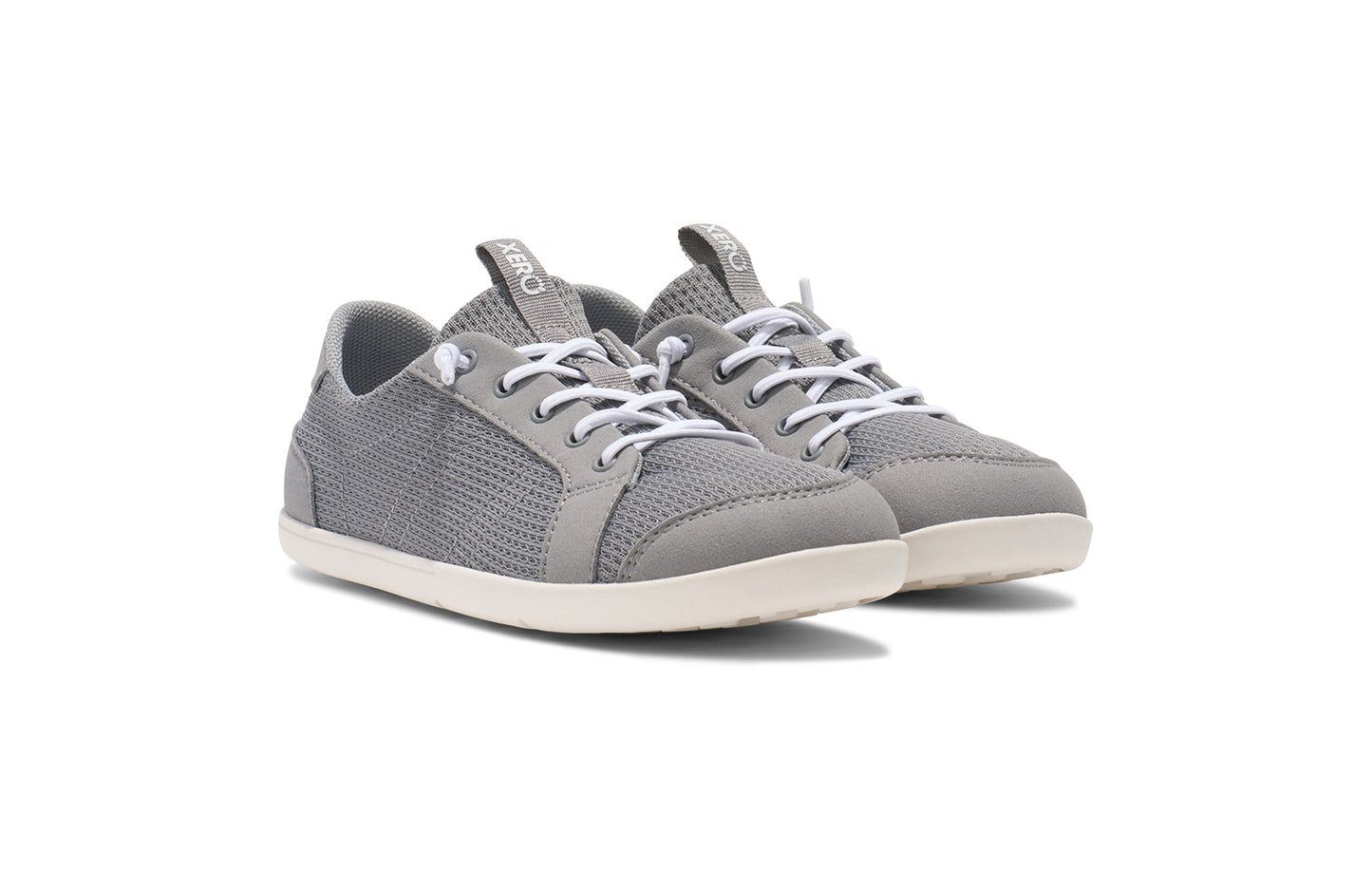 Xero Shoes Canada, barefoot shoes for kids. These minimalist shoes have flexible soles, wide toe boxes, and zero drop. Angled view of Xero Big Kid's Dillon in Alloy, a classic sneaker.