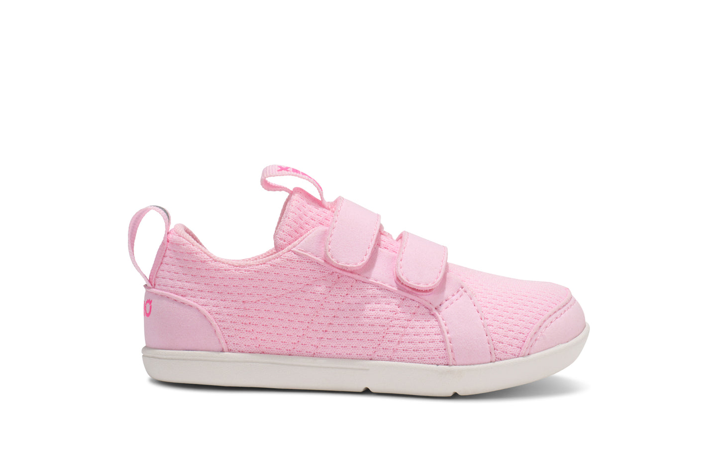 Xero Barefoot shoes for kids sold in Ontario, Canada. These minimalist shoes have flexible soles, wide toe boxes, and zero drop. Lateral side view of Xero Dillon Little Kids in Pink-a-Boo, a classic sneaker.