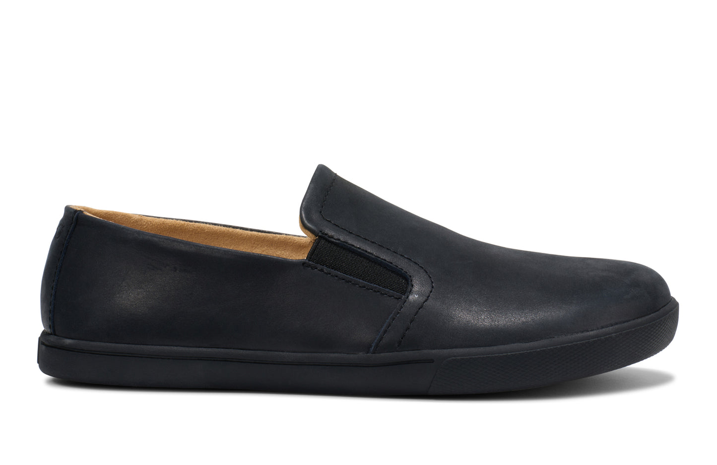 Xero Shoes Canada, specifically men’s barefoot shoes Canada. These minimalist shoes have flexible soles, wide toe boxes, and zero drop. Side view of Xero Men's Dilllon Leather Loaer in Black. Dressy flat.