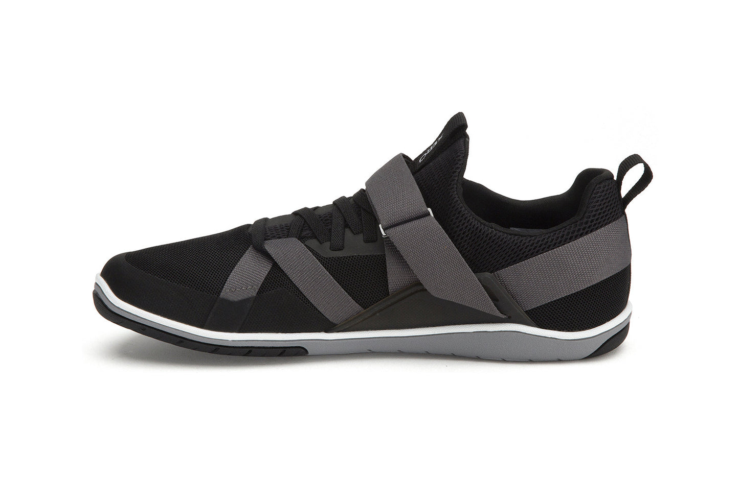 Xero Shoes Canada, specifically barefoot running shoes Canada. These minimalist shoes have flexible soles, wide toe boxes, and zero drop. Side view of Xero Women's Forza Trainer in Black/Asphalt. A stable training shoe.