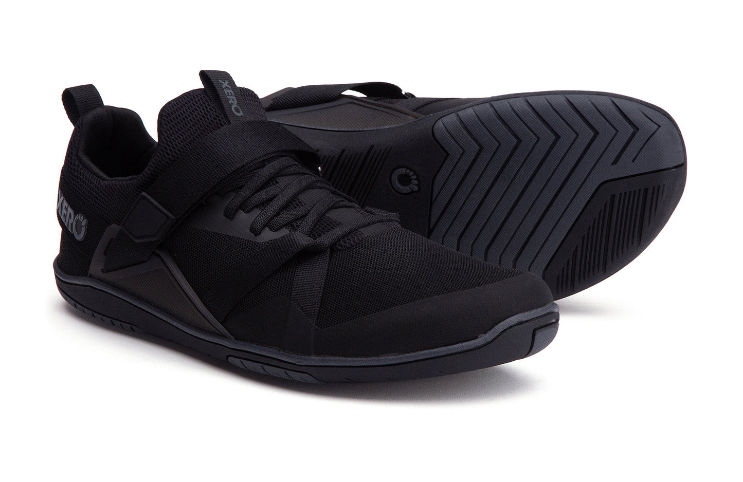 Xero Shoes Canada, specifically barefoot running shoes Canada. These minimalist shoes have flexible soles, wide toe boxes, and zero drop. Pair view of Xero Men's Forza Trainer in Black. A stable training shoe.