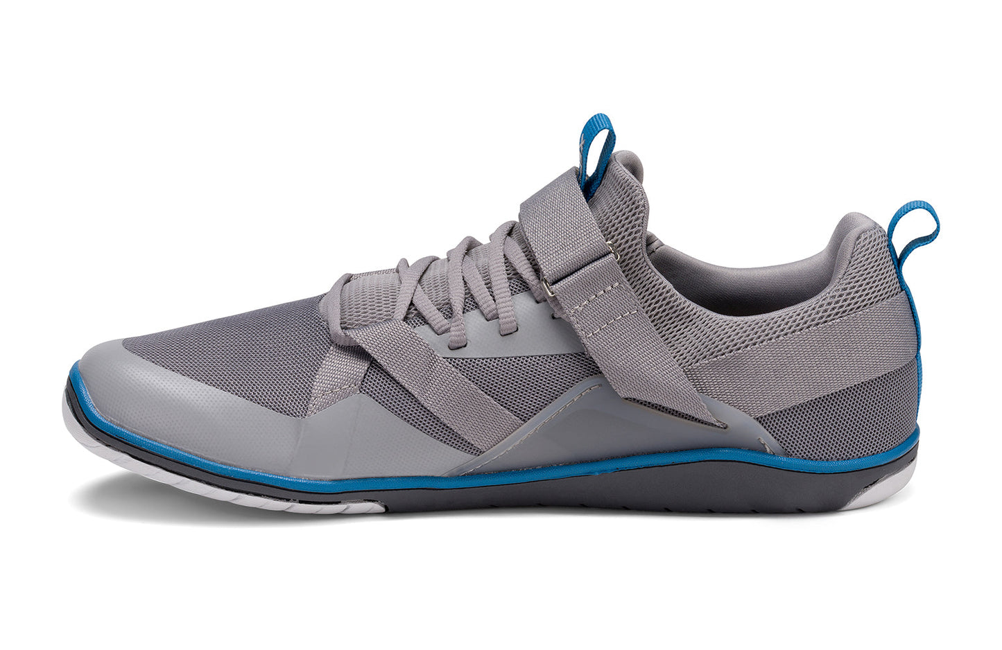 Xero Shoes Canada, specifically barefoot running shoes Canada. These minimalist shoes have flexible soles, wide toe boxes, and zero drop. Side view of Xero Men's Forza Trainer in Frost Gray. A stable training shoe.