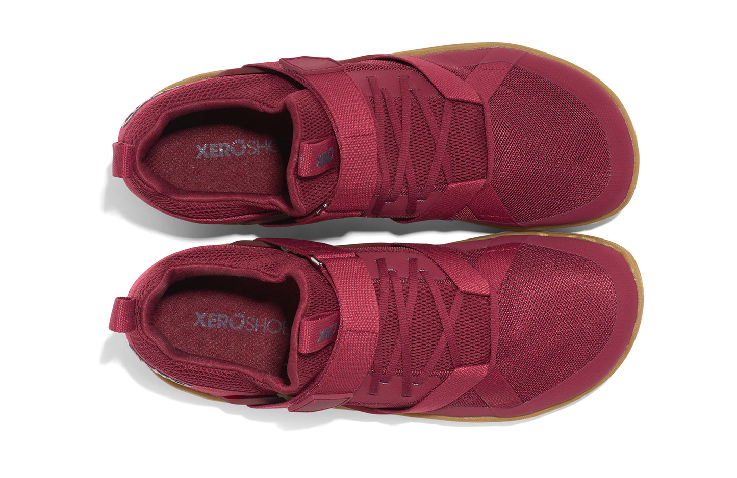 Xero Shoes Canada, specifically barefoot running shoes Canada. These minimalist shoes have flexible soles, wide toe boxes, and zero drop. Top view of Xero Women's Forza Trainer in Tibetan Red/Gum. A stable training shoe.