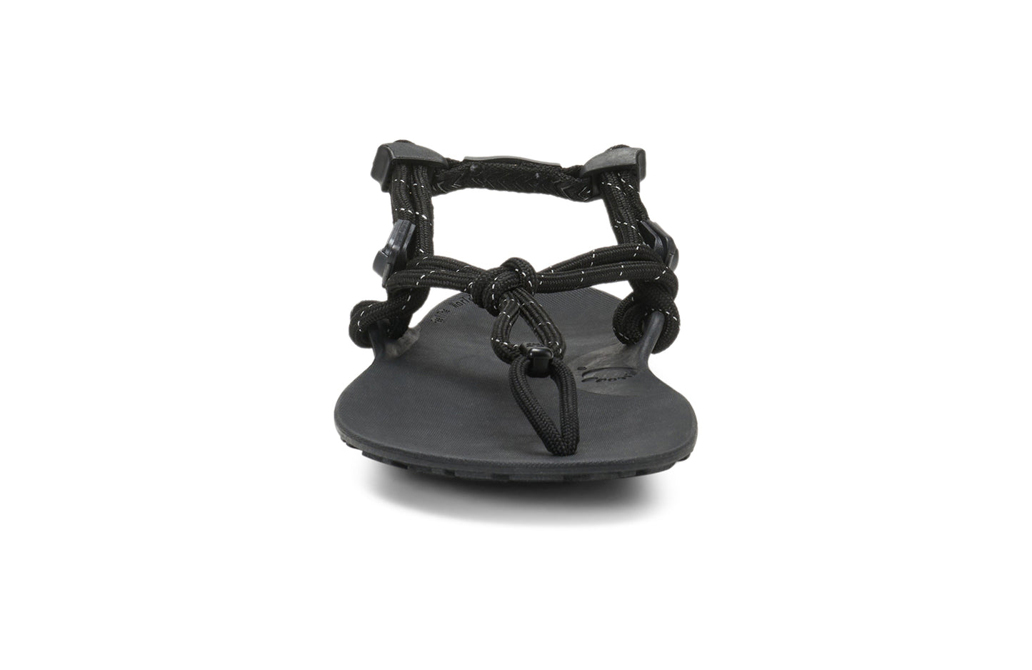 Xero Shoes Canada, specifically women’s barefoot shoes Canada. These minimalist shoes have flexible soles, wide toe boxes, and zero drop. Front view of Xero Women's Genesis in Black. Lightweight, packable, travel-friendly sandal.