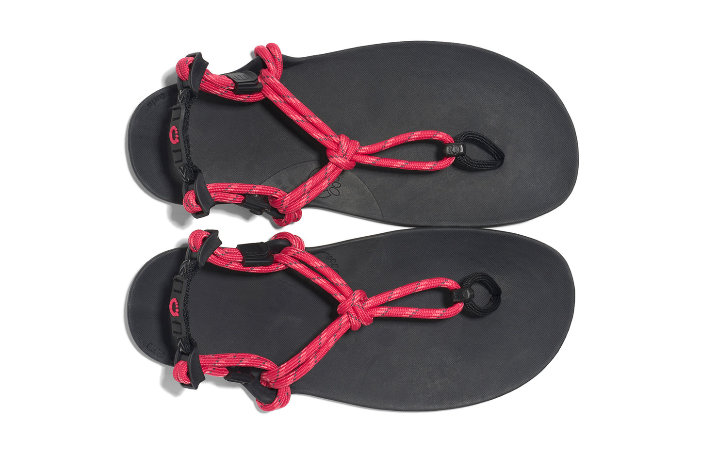 Xero Shoes Canada, specifically women’s barefoot shoes Canada. These minimalist shoes have flexible soles, wide toe boxes, and zero drop. Top view of Xero Women's Genesis in Raspberry. Lightweight, packable, travel-friendly sandal.