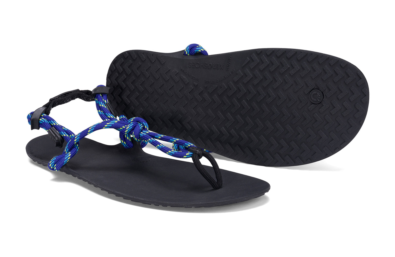 Xero Shoes Canada, specifically men’s barefoot shoes Canada. These minimalist shoes have flexible soles, wide toe boxes, and zero drop. Side and sole pair view of Xero Men's Genesis in Sodalite Blue. Lightweight, packable, travel-friendly sandal.