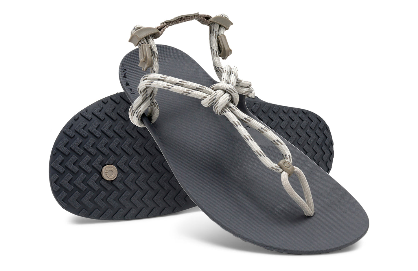 Xero Shoes Canada, specifically men’s barefoot shoes Canada. These minimalist shoes have flexible soles, wide toe boxes, and zero drop. Angled pair view of Xero Men's Genesis in Stone. Lightweight, packable, travel-friendly sandal.