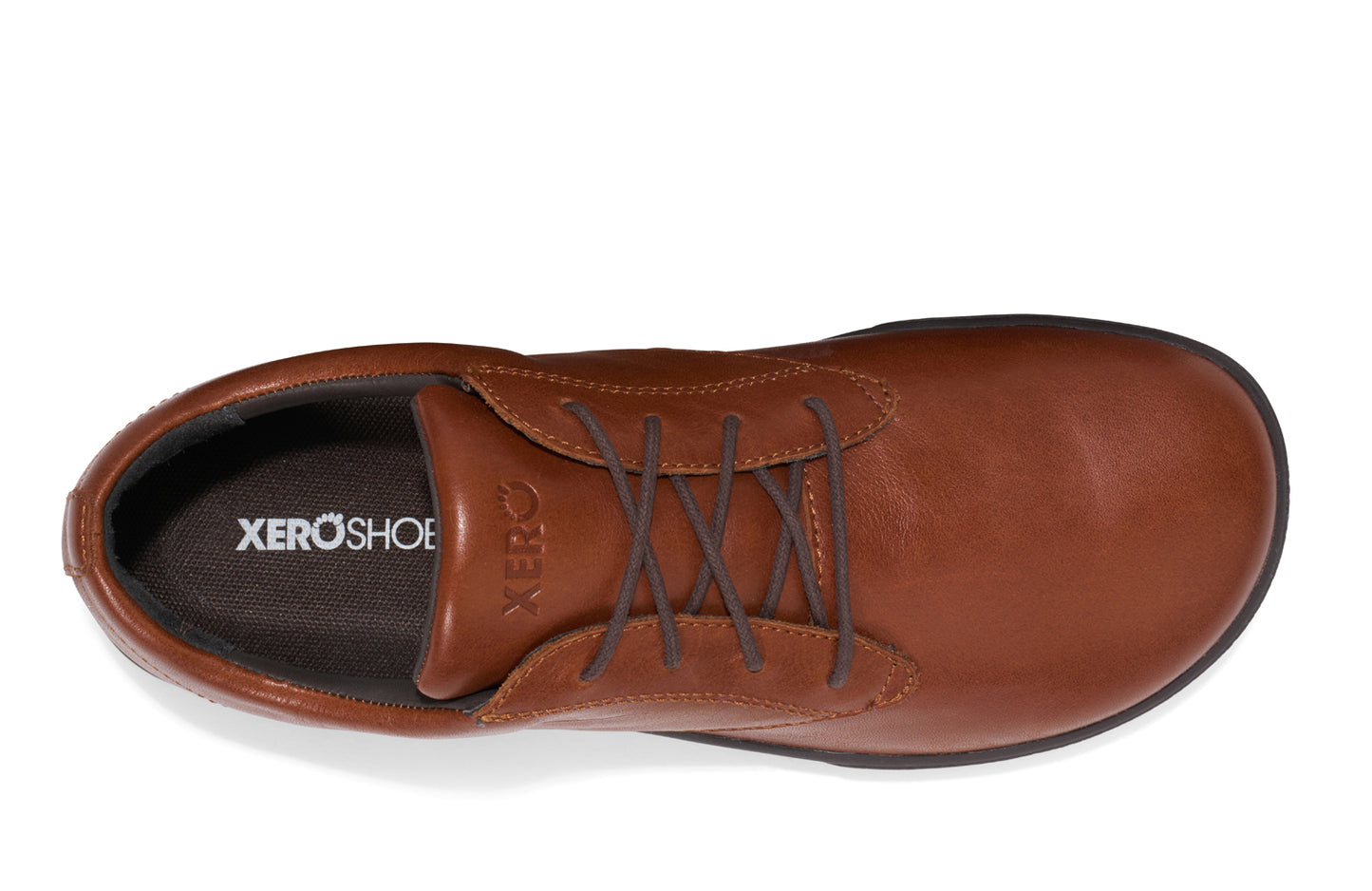 Xero Shoes Canada, specifically men’s barefoot shoes Canada. These minimalist shoes have flexible soles, wide toe boxes, and zero drop. Top view of Xero Men's Glenn Dress in Brown. Dressy leather sneaker.