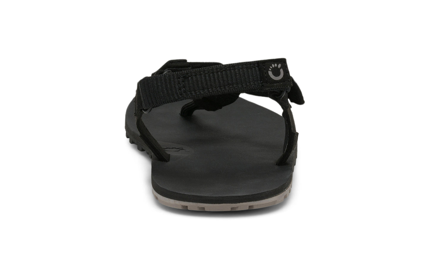 Xero Shoes Canada, specifically men’s barefoot shoes Canada. These minimalist shoes have flexible soles, wide toe boxes, and zero drop. Back view of Men's H-Trail in Black. A huarache-style hiking sandal.