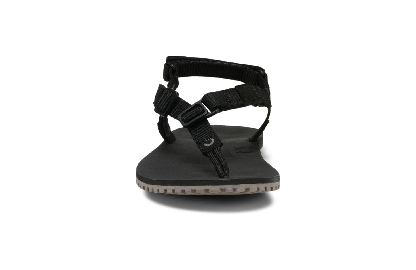 Xero Shoes Canada, specifically men’s barefoot shoes Canada. These minimalist shoes have flexible soles, wide toe boxes, and zero drop. Front view of Men's H-Trail in Black. A huarache-style hiking sandal.