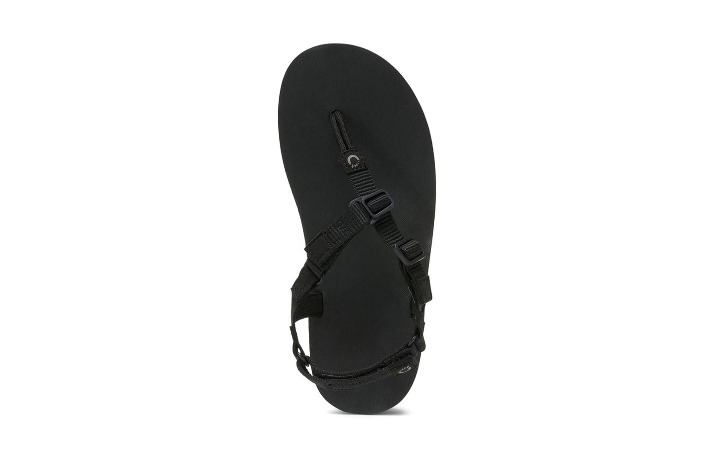 Xero Shoes Canada, specifically men’s barefoot shoes Canada. These minimalist shoes have flexible soles, wide toe boxes, and zero drop. Top view of Men's H-Trail in Black. A huarache-style hiking sandal.