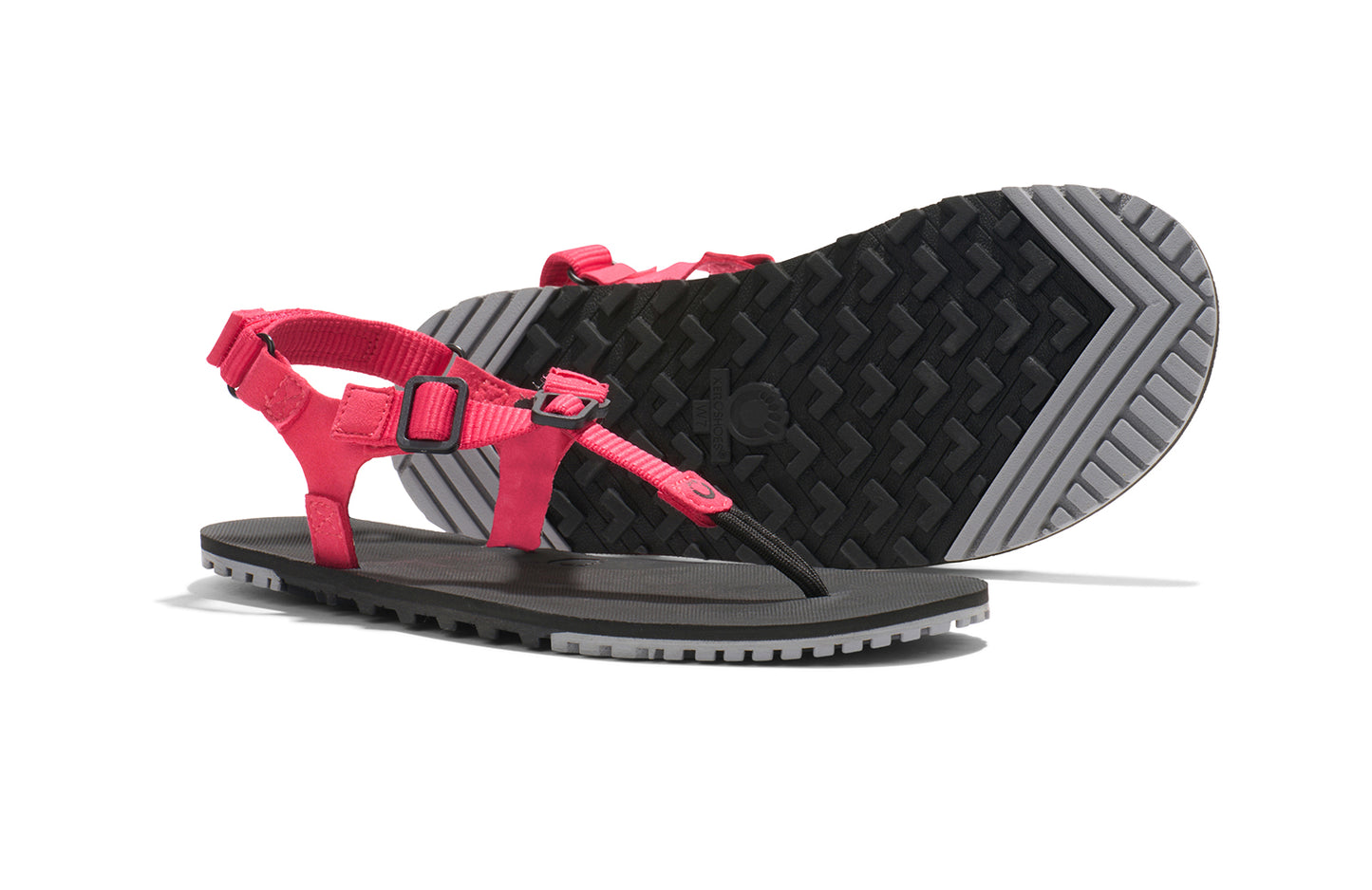 Xero Shoes Canada, specifically women’s barefoot shoes Canada. These minimalist shoes have flexible soles, wide toe boxes, and zero drop. Pair view of Women's H-Trail in Raspberry. A huarache-style hiking sandal.