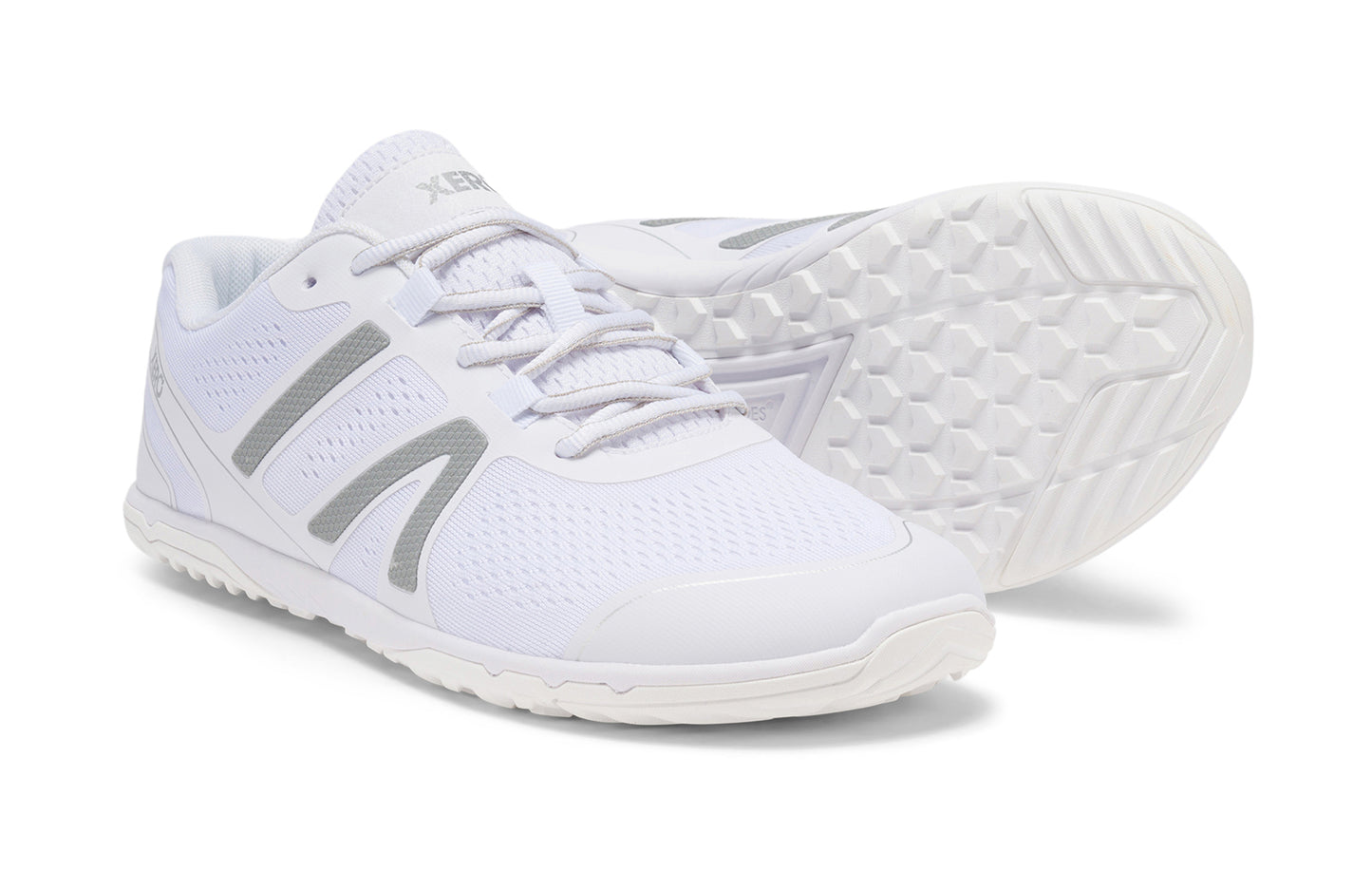 Xero Shoes Canada, specifically barefoot running shoes Canada. These minimalist shoes have flexible soles, wide toe boxes, and zero drop. Pair view of Xero Men's HFS II in White. Lightweight road runner.