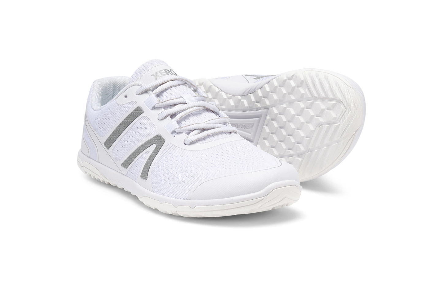 Xero Shoes Canada, specifically barefoot running shoes Canada. These minimalist shoes have flexible soles, wide toe boxes, and zero drop. Pair view of Xero Women's HFS II in White. Lightweight road runner.