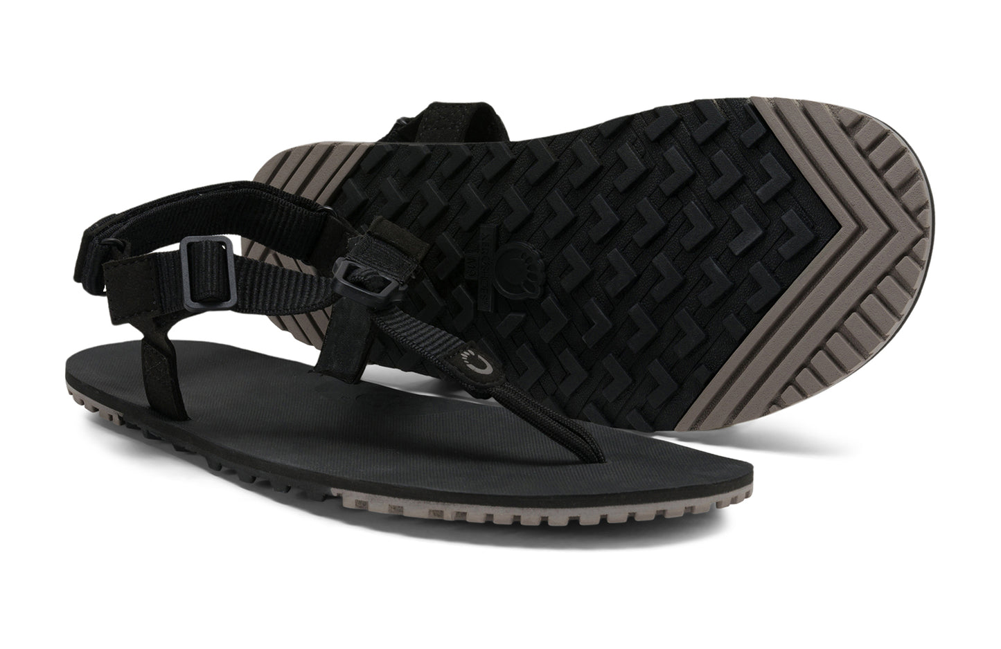 Xero Barefoot Sandals sold in Ontario, Canada. These minimalist shoes have flexible soles, wide toe boxes, and zero drop. Pair view of Women's H-Trail in Black. A huarache-style hiking sandal.