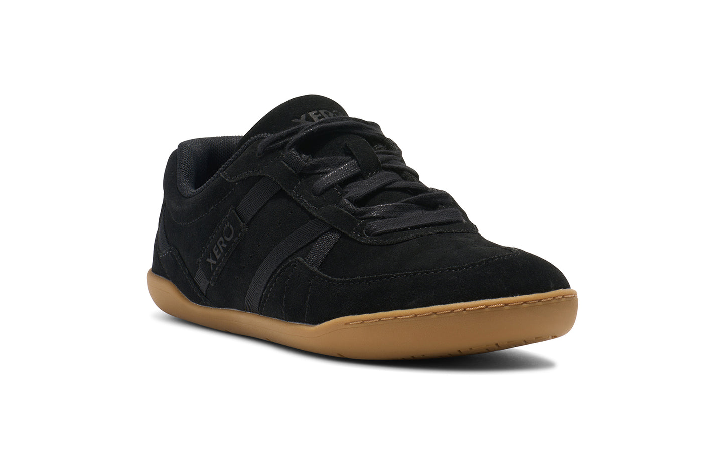 Xero Shoes Canada, specifically women’s barefoot shoes Canada. These minimalist shoes have flexible soles, wide toe boxes, and zero drop. Angled view of Xero Women's Kelso in Black/Gum. Leather and suede court-style shoe.