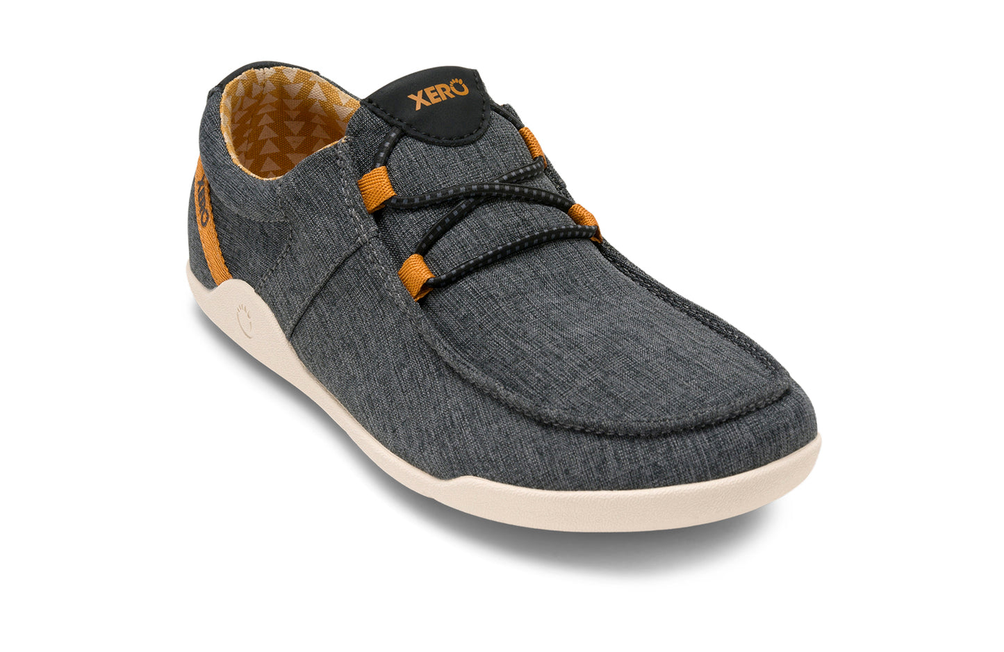 Xero Shoes Canada, specifically women’s barefoot shoes Canada. These minimalist shoes have flexible soles, wide toe boxes, and zero drop. Angled view of Xero Women's Kona in Asphalt. Moccasin inspired casual shoe.