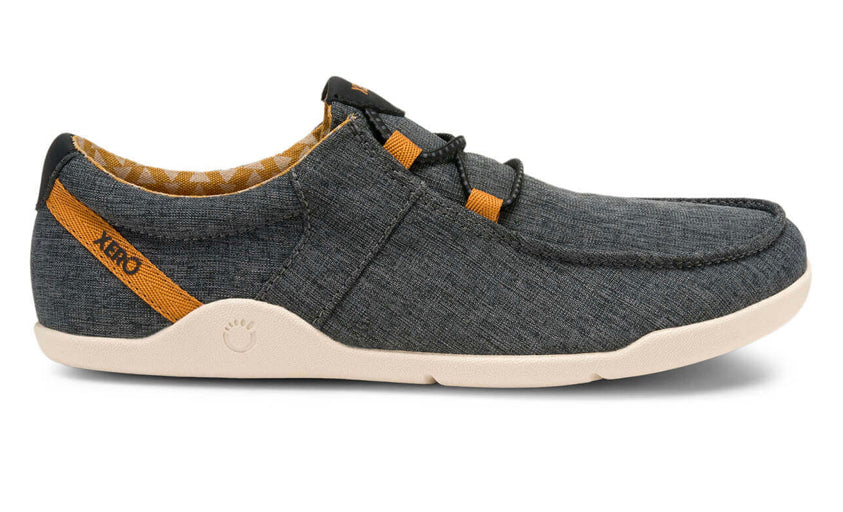 Xero Shoes Canada, specifically women’s barefoot shoes Canada. These minimalist shoes have flexible soles, wide toe boxes, and zero drop. Lateral side view of Xero Women's Kona in Asphalt. Moccasin inspired casual shoe.