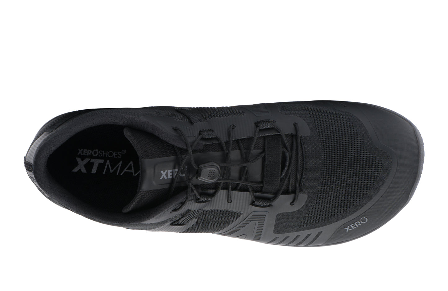 Black athletic shoe with 'XT' branding on a white background. Tru Stride Co brings Xero Shoes to Canada