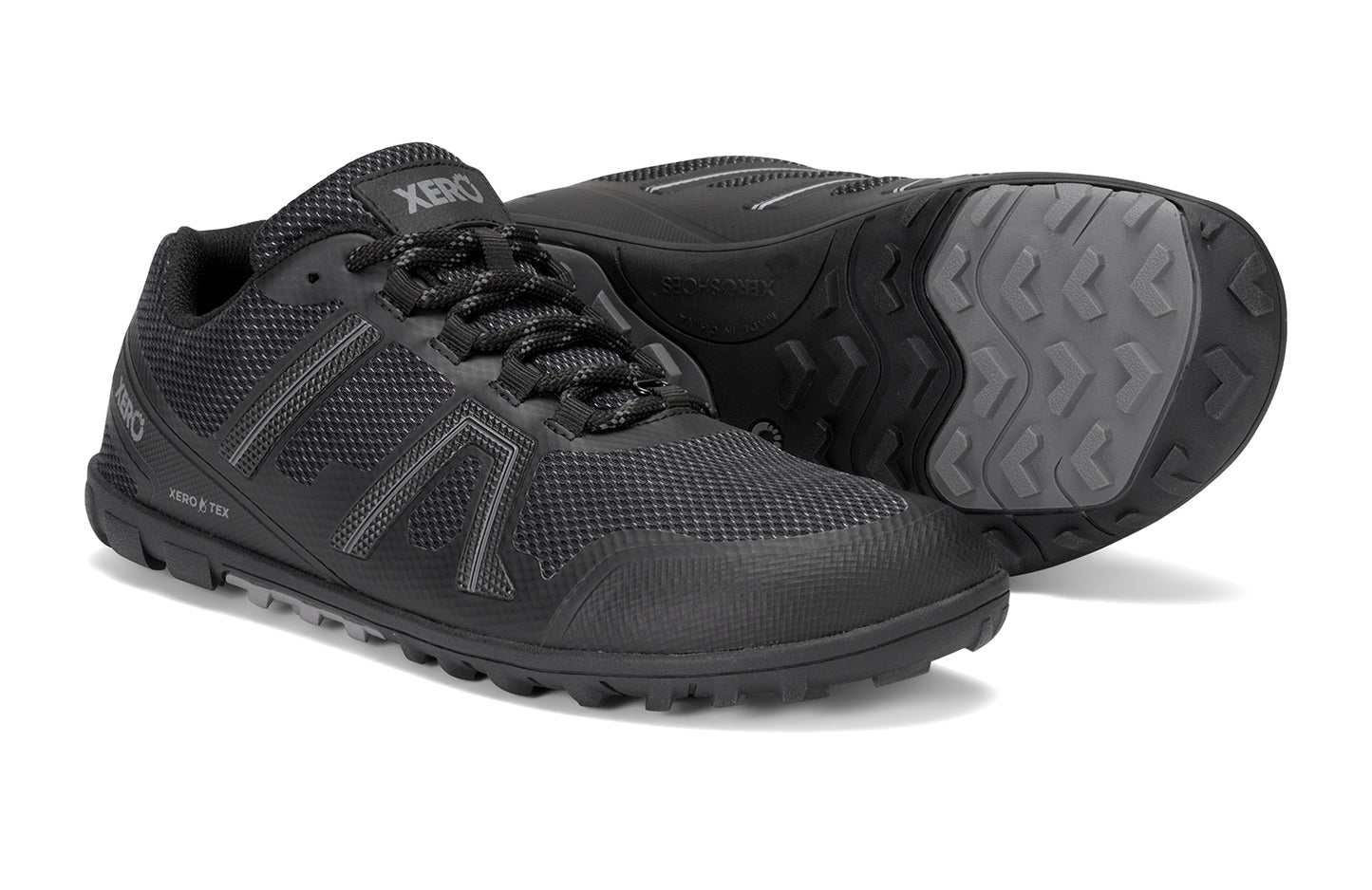 Xero Shoes Canada, specifically barefoot hiking shoes Canada. These minimalist shoes have flexible soles, wide toe boxes, and zero drop. Side and sole pair view of Xero Men's Mesa Trail II in Black. Durable, waterproof hiking shoe.