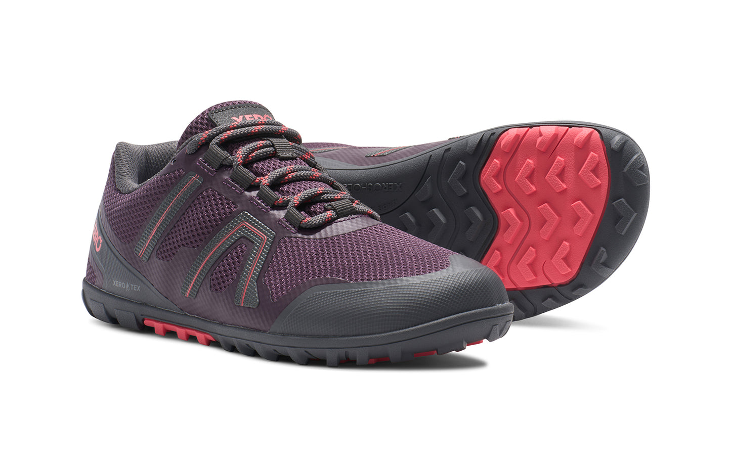 Xero Shoes Canada, specifically barefoot hiking shoes Canada. These minimalist shoes have flexible soles, wide toe boxes, and zero drop. Side and sole pair view of Xero Women's Mesa Trail II in Plum Perfect/Sunset Coral. Durable, waterproof hiking shoe.