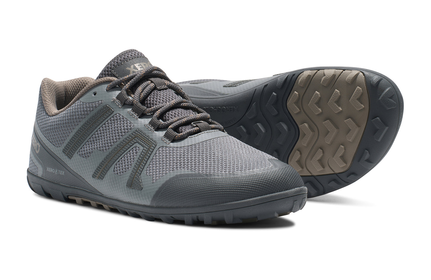 Xero Shoes Canada, specifically barefoot hiking shoes Canada. These minimalist shoes have flexible soles, wide toe boxes, and zero drop. Side and sole pair view of Xero Men's Mesa Trail II in Steel Gray/Asphalt. Durable, waterproof hiking shoe.