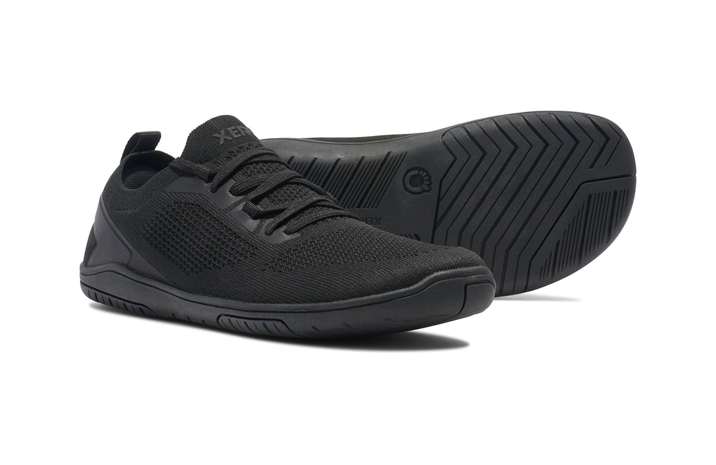 Xero Shoes Canada, specifically barefoot running shoes Canada. These minimalist shoes have flexible soles, wide toe boxes, and zero drop. Pair view of Xero Women's Nexus Knit in Black Black. An athletic, comfortable shoe.