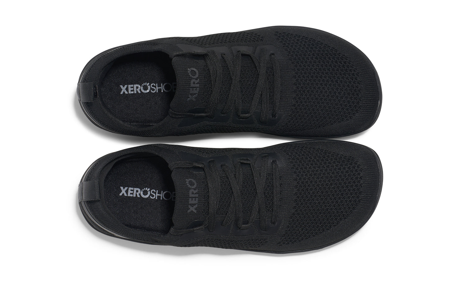 Xero Shoes Canada, specifically barefoot running shoes Canada. These minimalist shoes have flexible soles, wide toe boxes, and zero drop. Top view of Xero Women's Nexus Knit in Black Black. An athletic, comfortable shoe.