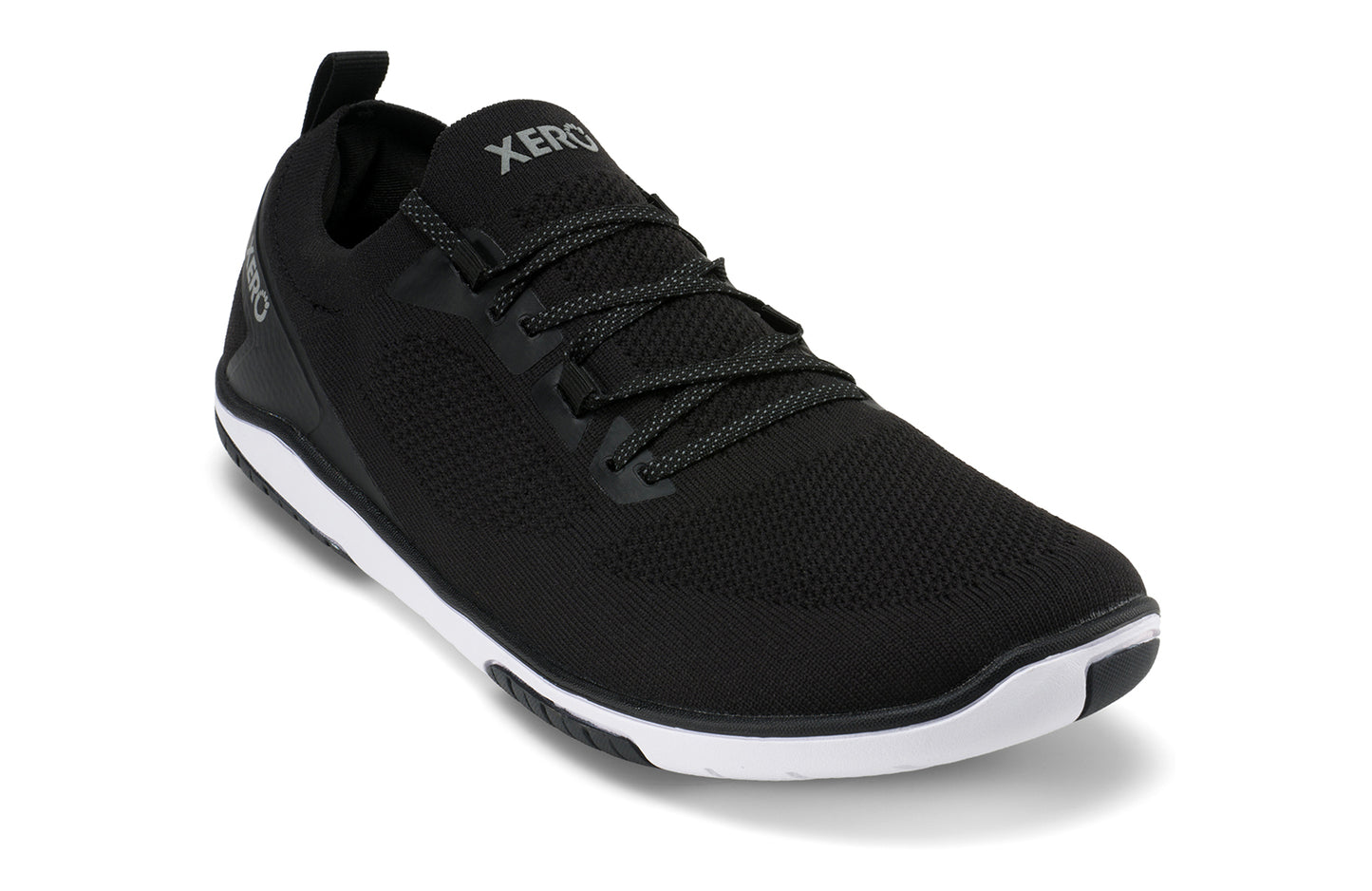 Xero Shoes Canada, specifically barefoot running shoes Canada. These minimalist shoes have flexible soles, wide toe boxes, and zero drop. Angled view of Xero Men's Nexus Knit in Black. An athletic, comfortable shoe.