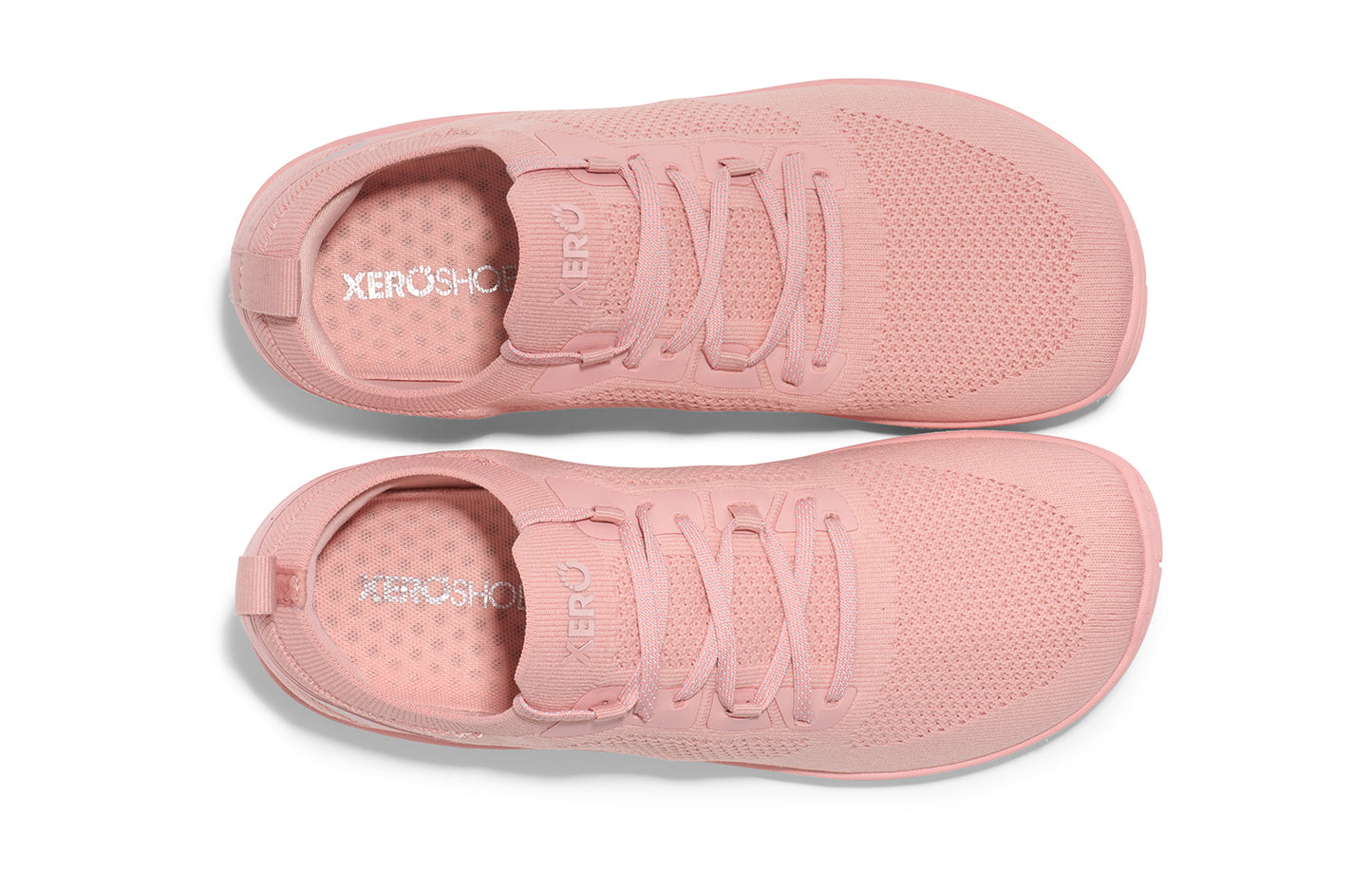 Xero Shoes Canada, specifically barefoot running shoes Canada. These minimalist shoes have flexible soles, wide toe boxes, and zero drop. Top view of Xero Women's Nexus Knit in Pink Sand. An athletic, comfortable shoe.