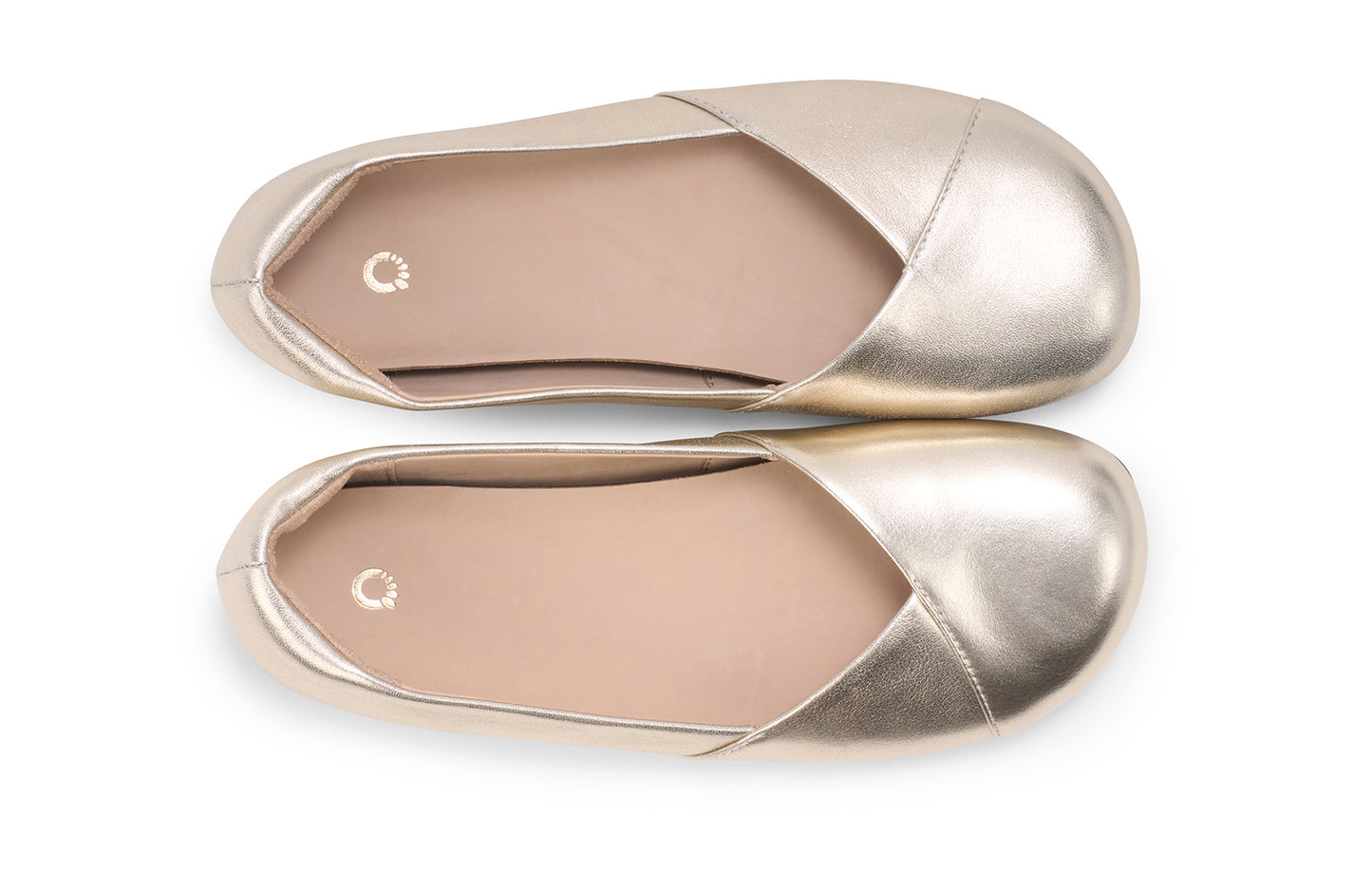 Xero Shoes Canada, specifically women’s barefoot shoes Canada. These minimalist shoes have flexible soles, wide toe boxes, and zero drop. Top view of Xero Women's Phoenix Leather in Gold Metallic. Women's elegant flat.