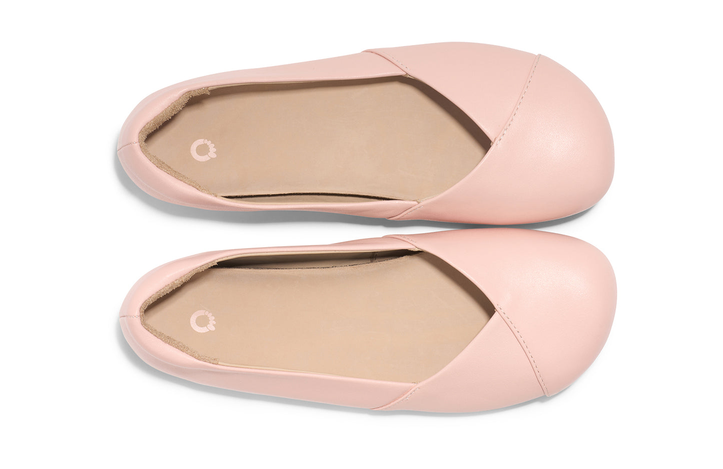 Xero Shoes Canada, specifically women’s barefoot shoes Canada. These minimalist shoes have flexible soles, wide toe boxes, and zero drop. Top view of Xero Women's Phoenix Leather in Pink Sand. Women's elegant flat.