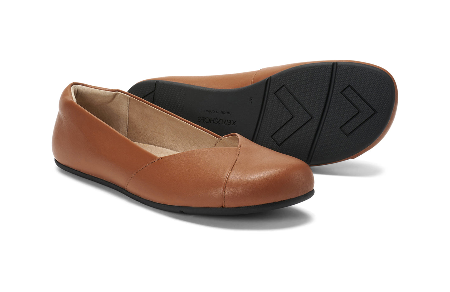Xero Shoes Canada, specifically women’s barefoot shoes Canada. These minimalist shoes have flexible soles, wide toe boxes, and zero drop. Pair view of Xero Women's Phoenix Leather in Smooth Brown. Women's elegant flat.