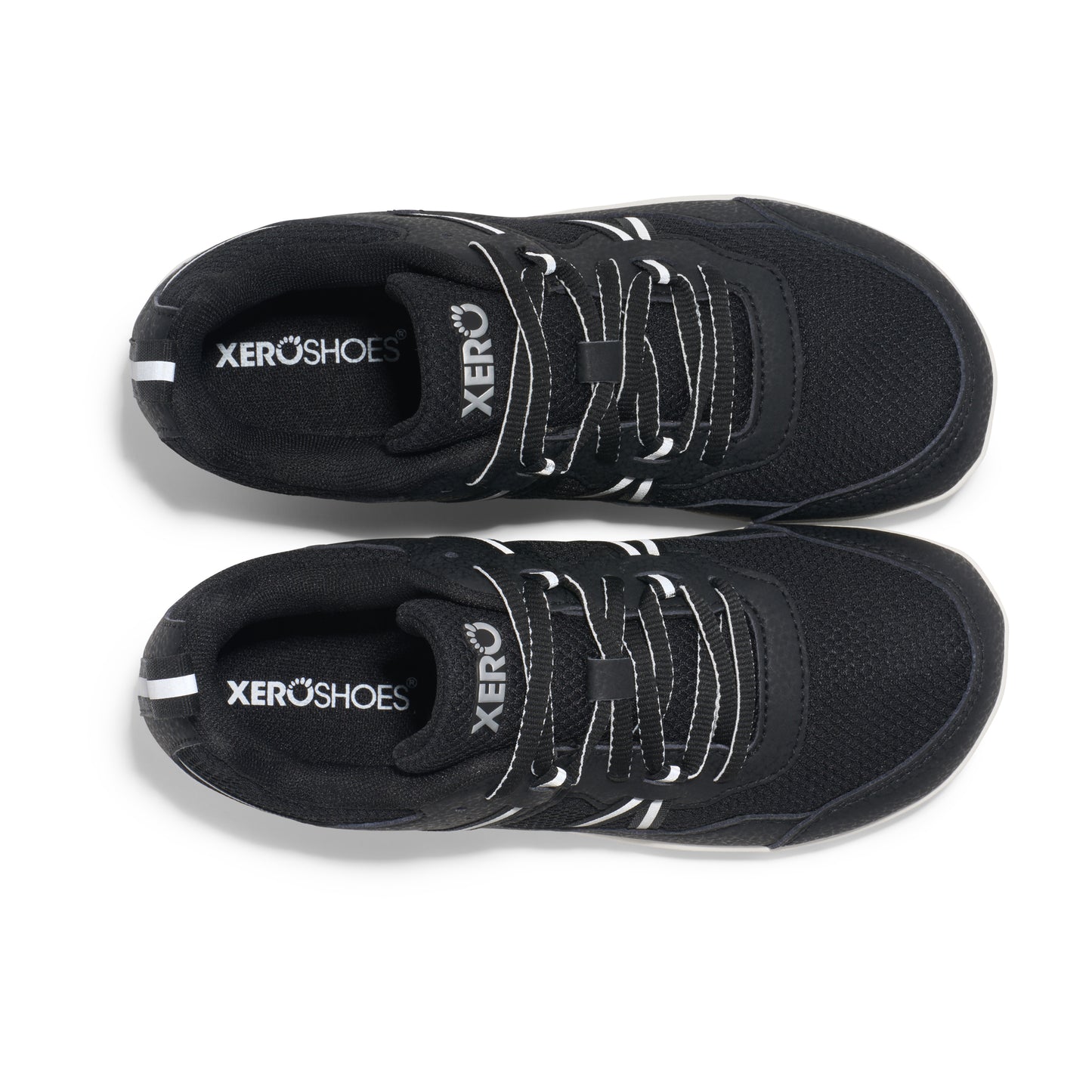 Xero Barefoot Shoes for kids sold in Ontario, Canada. These minimalist shoes have flexible soles, wide toe boxes, and zero drop. Top view of Xero Kid's Prio in Black/White. Casual kid's sneaker.