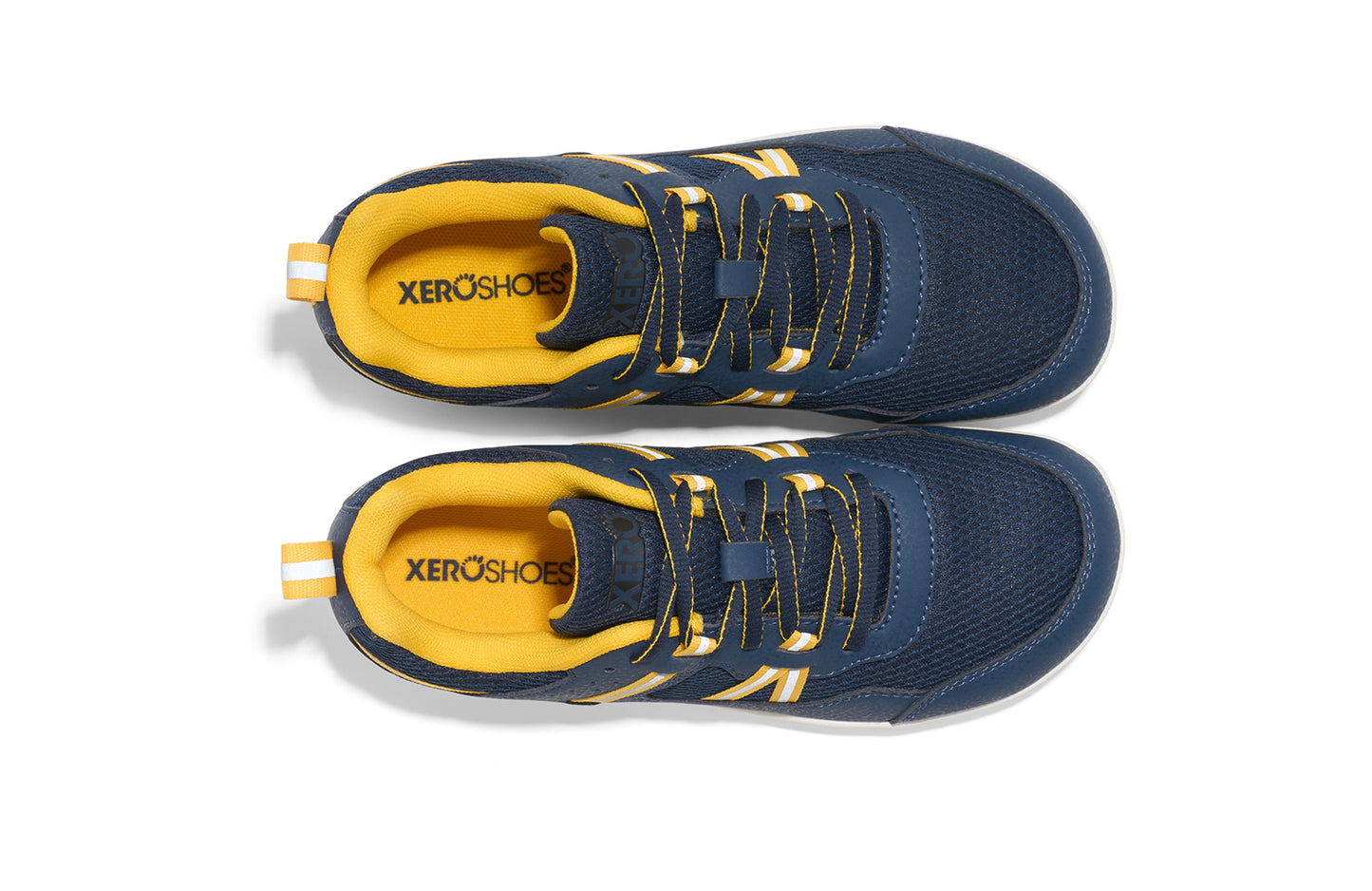 Xero Barefoot Shoes for kids sold in Ontario, Canada. These minimalist shoes have flexible soles, wide toe boxes, and zero drop. Top view of Xero Kid's Prio in Dress Blues/Yellow. Casual kid's sneaker.
