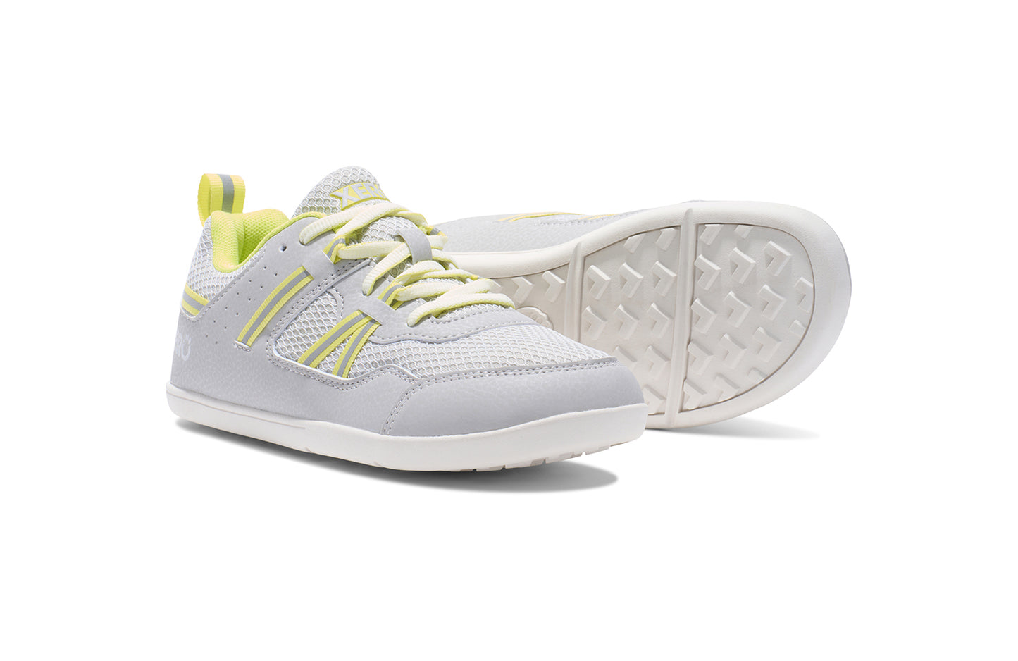 Xero Barefoot Shoes for kids sold in Ontario, Canada. These minimalist shoes have flexible soles, wide toe boxes, and zero drop. Pair view of Xero Kid's Prio in Lunar Rock/Sunny Lime. Casual kid's sneaker.