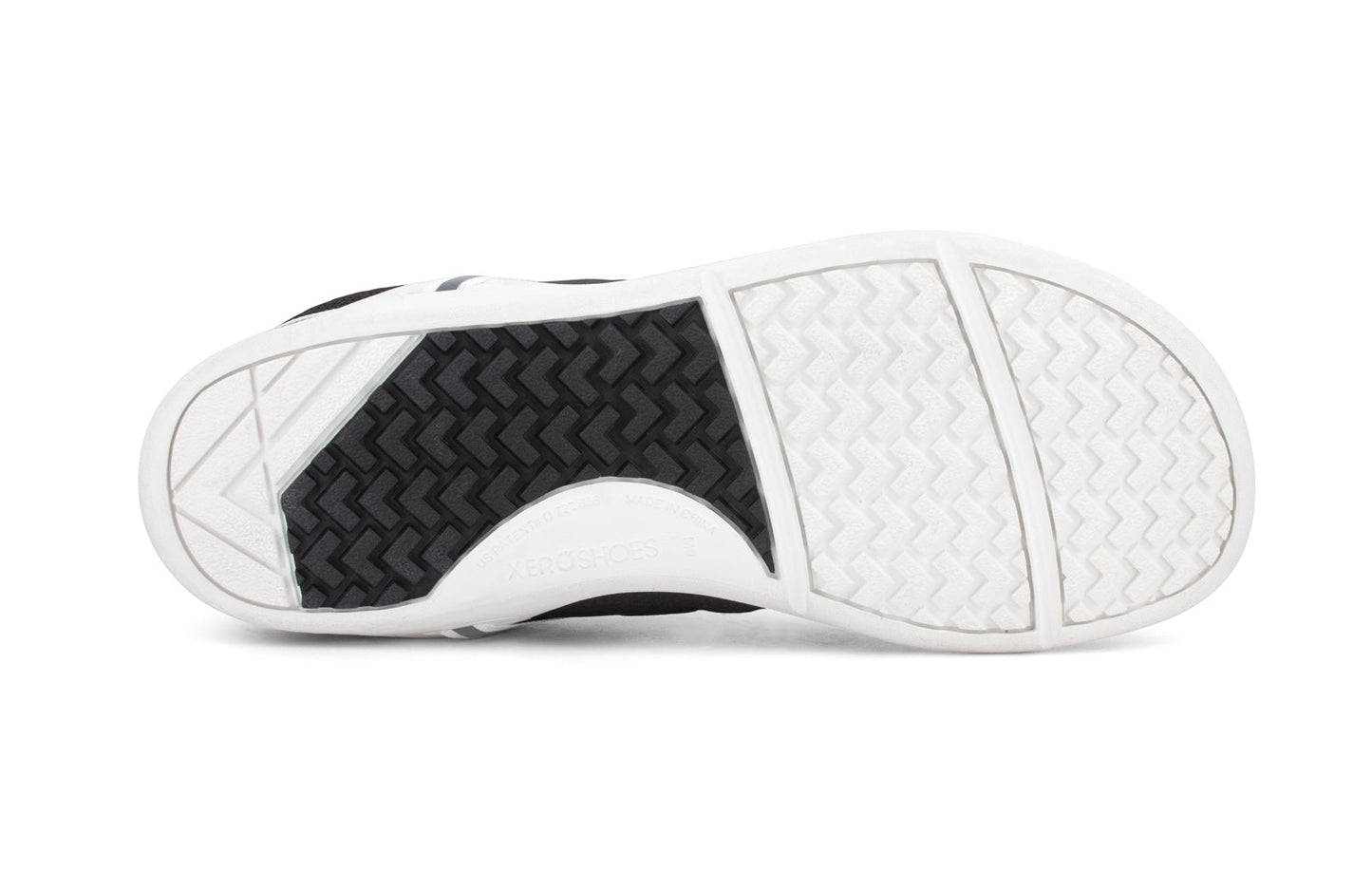 Xero Shoes Canada, specifically men’s barefoot shoes Canada. These minimalist shoes have flexible soles, wide toe boxes, and zero drop. Sole view of Xero Men's Prio in Black White. A running and fitness shoe.