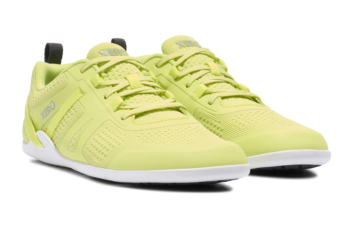 Xero Shoes Canada, specifically barefoot running shoes Canada. These minimalist shoes have flexible soles, wide toe boxes, and zero drop. Angled view of Xero Men's Prio Neo in Sunny Lime. Shoes made for performance and comfort.
