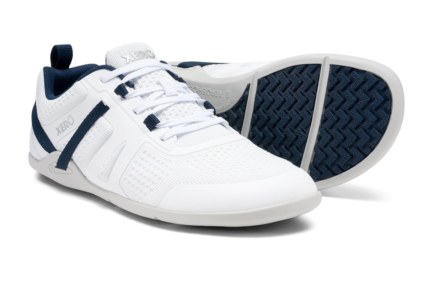 Xero Shoes Canada, specifically barefoot running shoes Canada. These minimalist shoes have flexible soles, wide toe boxes, and zero drop. Pair view of Xero Men's Prio Neo in White. Shoes made for performance and comfort.
