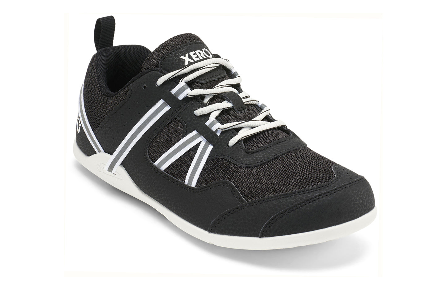 Xero Shoes Canada, specifically men’s barefoot shoes Canada. These minimalist shoes have flexible soles, wide toe boxes, and zero drop. Angled view of Xero Men's Prio in Black White. A running and fitness shoe.