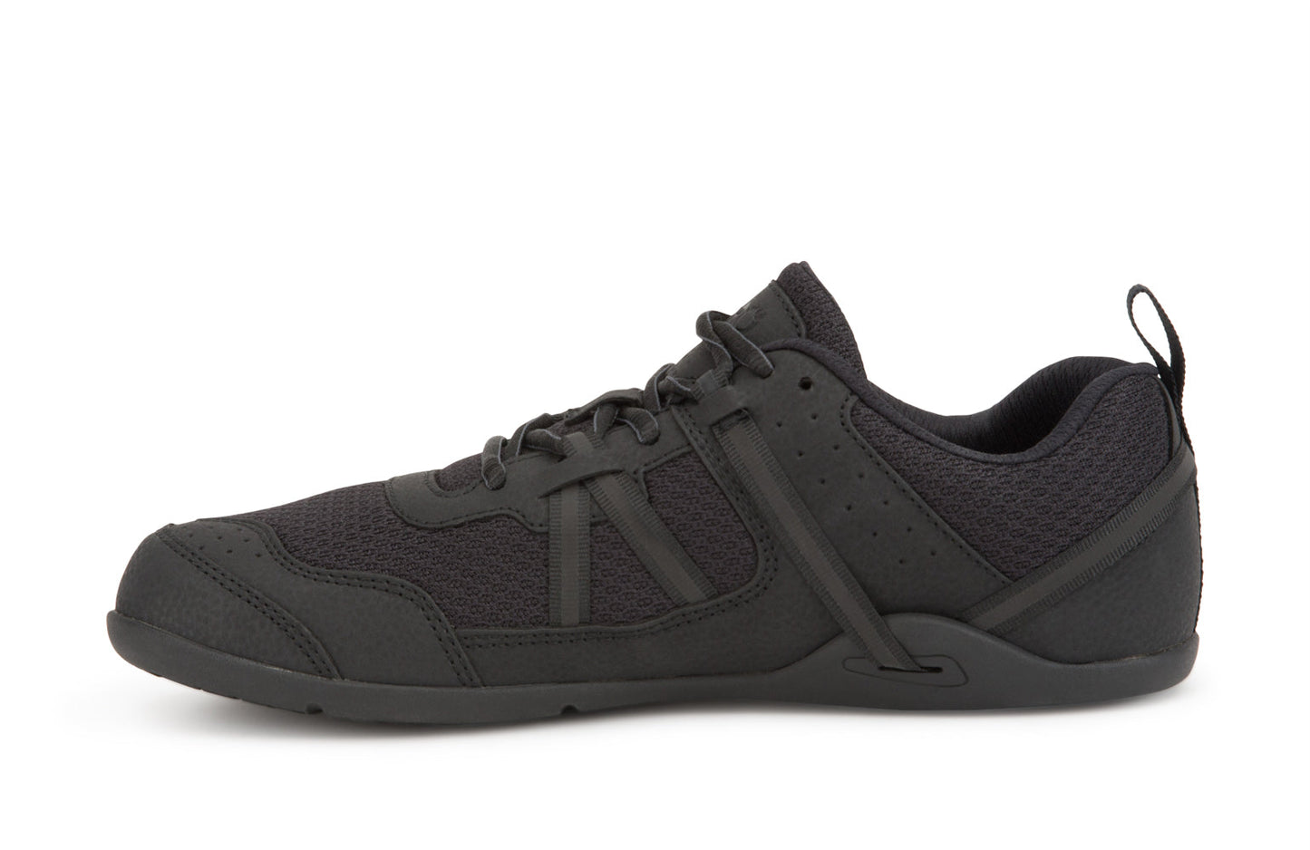 Xero Barefoot Shoes sold in Ontario, Canada. These minimalist shoes have flexible soles, wide toe boxes, and zero drop. Side view of Xero Men's Prio in Black. A running and fitness shoe.