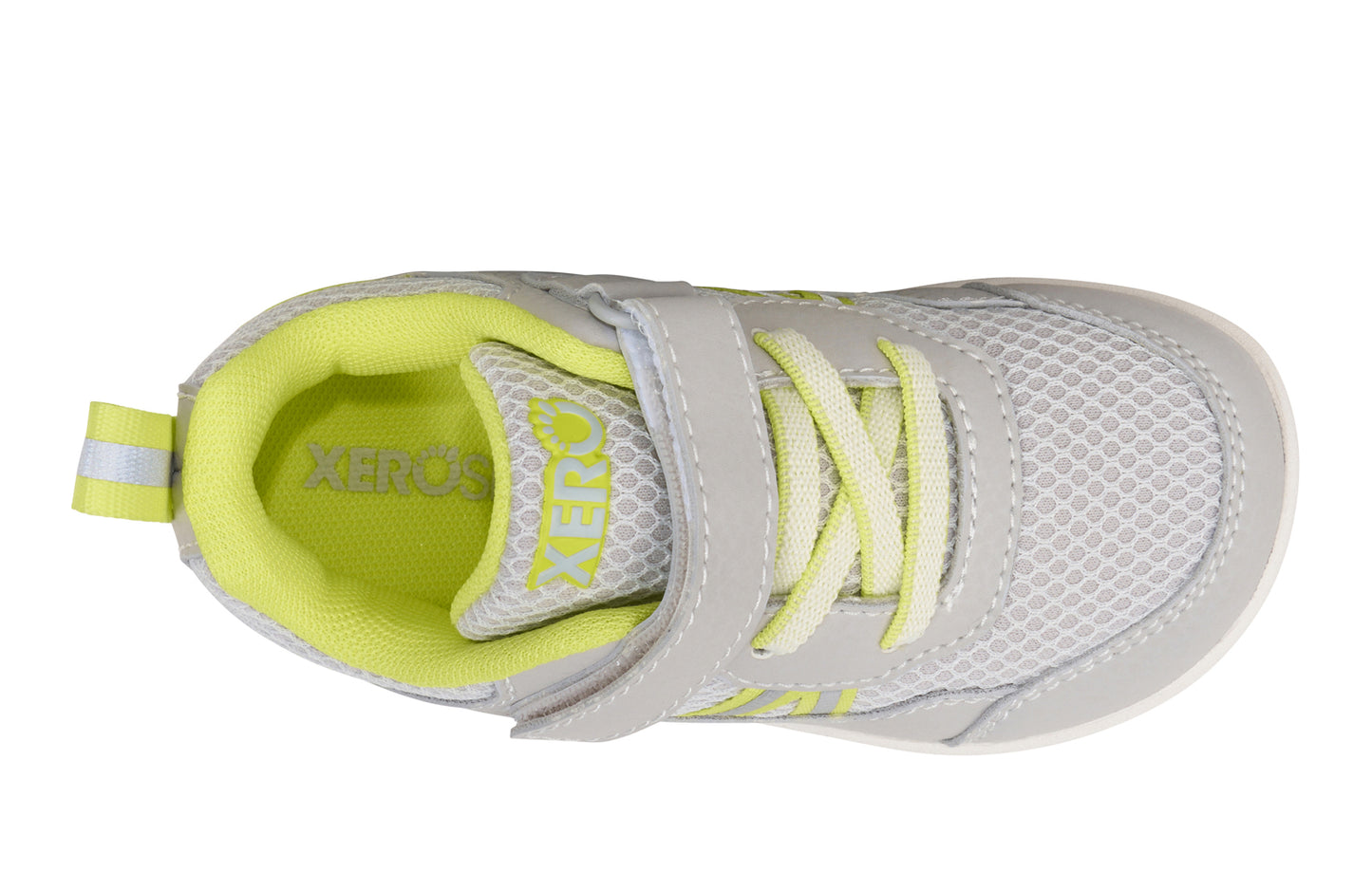 Xero Barefoot Shoes for little kids sold in Ontario, Canada. These minimalist shoes have flexible soles, wide toe boxes, and zero drop. Top view of Xero Little Kid's Prio in Sunnny Lime. Casual kid's sneaker.