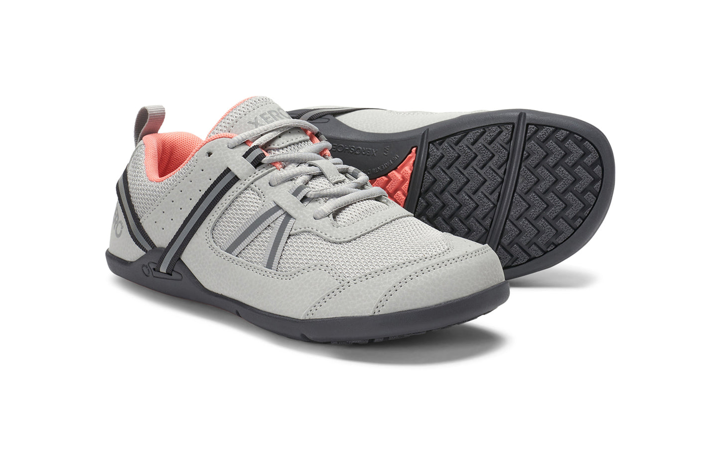 Xero Shoes Canada, specifically women’s barefoot shoes Canada. These minimalist shoes have flexible soles, wide toe boxes, and zero drop. Pair view of Xero Women's Prio in Lunar Rock. A running and fitness shoe.