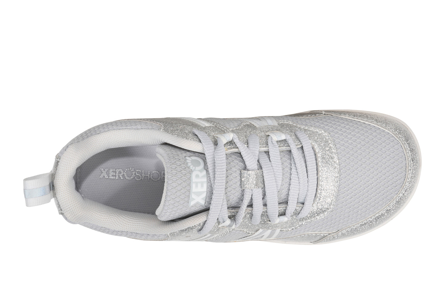 Xero Barefoot Shoes for kids sold in Ontario, Canada. These minimalist shoes have flexible soles, wide toe boxes, and zero drop. Top view of Xero Kid's Prio in Silver Glitter. Casual kid's sneaker.