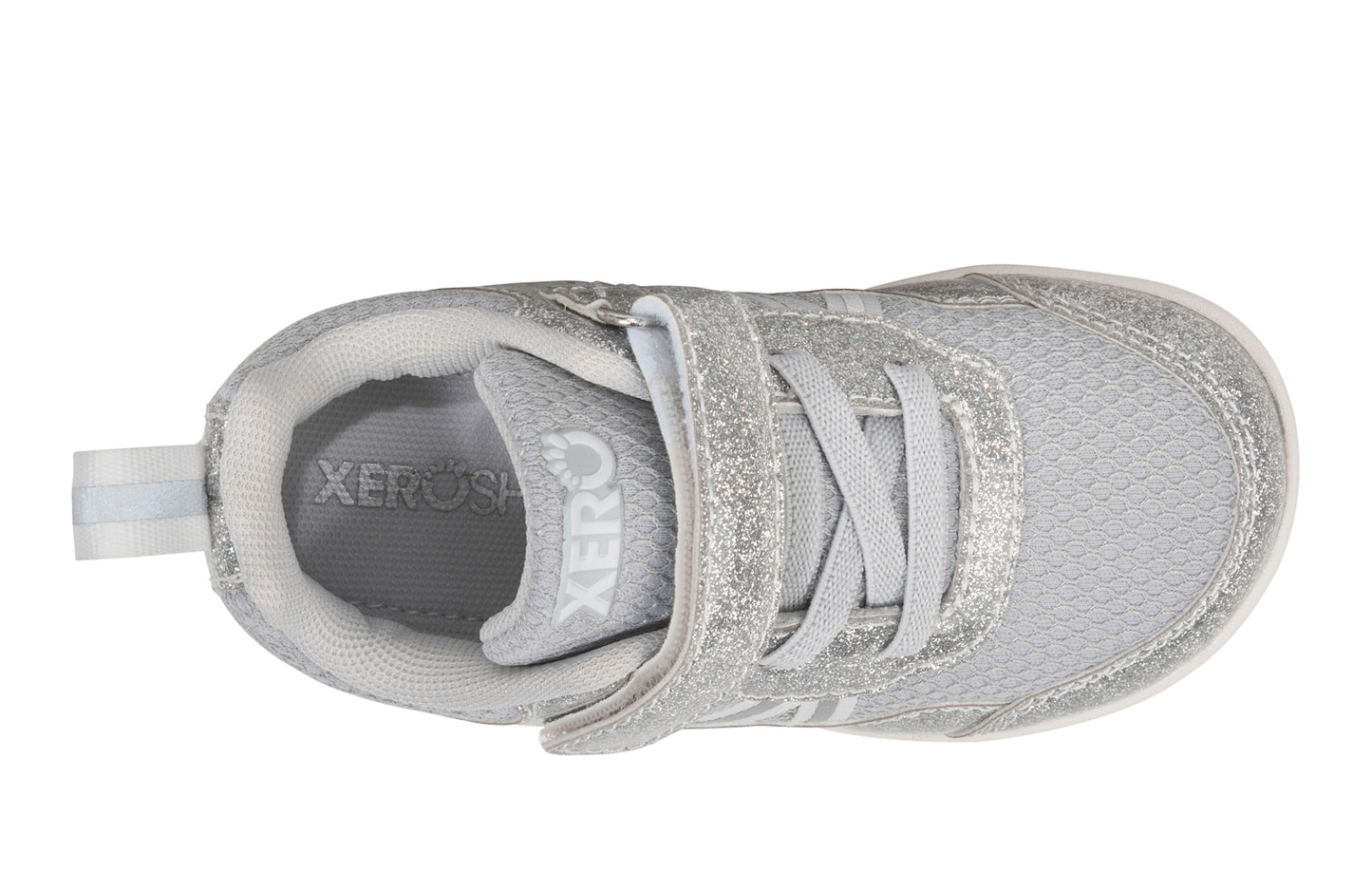 Xero Barefoot Shoes for little kids sold in Ontario, Canada. These minimalist shoes have flexible soles, wide toe boxes, and zero drop. Top view of Xero Little Kid's Prio in Silver Glitter. Casual kid's sneaker.