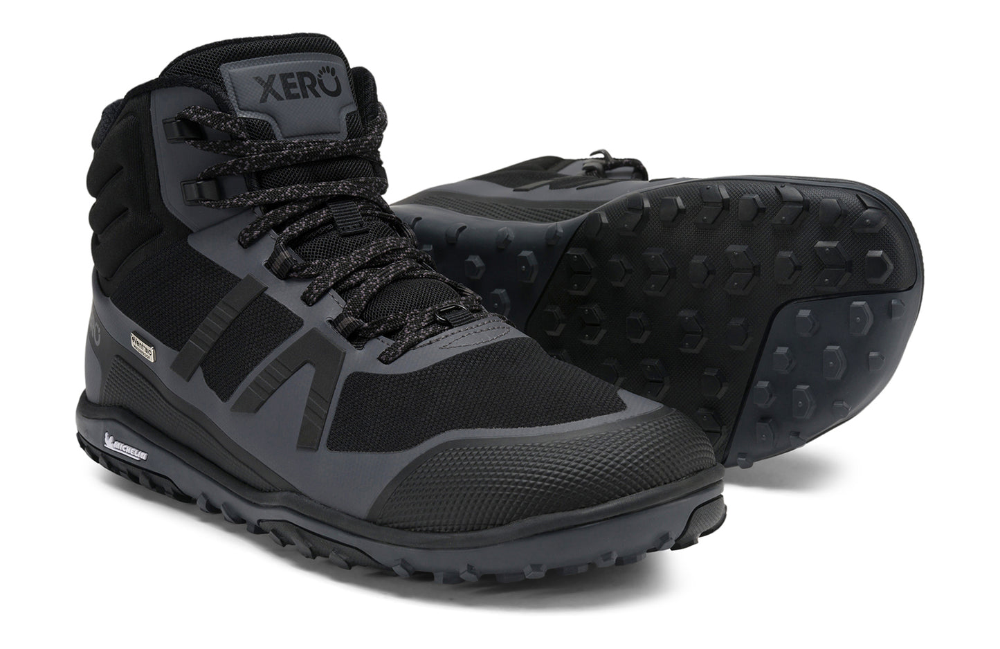Xero Barefoot Shoes sold in Ontario, Canada. These minimalist shoes have flexible soles, wide toe boxes, and zero drop. Pair view of Xero Men's Scrambler Mid II WP in Black/Asphalt, a lightweight waterproof hiking shoe.