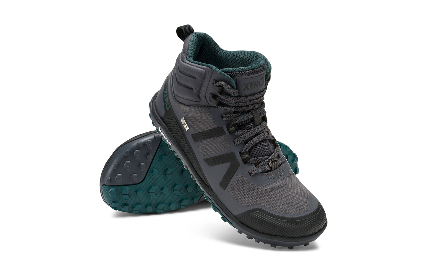 Xero Barefoot Shoes sold in Ontario, Canada. These minimalist shoes have flexible soles, wide toe boxes, and zero drop. Angled pair view of Xero Women's Scrambler Mid II WP in Asphalt/Sea Moss, a lightweight waterproof hiking shoe.